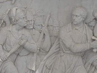 One of the reliefs, showing fighting in Brussels in 1830