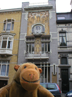 Mr Monkey looking at the Maison Cauchie