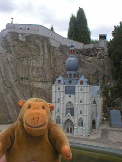 Mr Monkey looking at the collegiate church in Dinant
