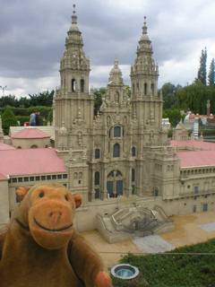 Mr Monkey looking at the cathedral of Santiago de Compostela