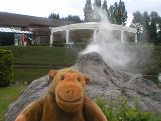 Mr Monkey looking at Vesuvius with more steam coming out