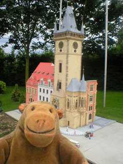 Mr Monkey looking at Prague Town Hall