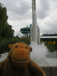 Mr Monkey watching Ariane smoke a little