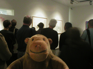 Mr Monkey at the back of a crowd looking at Victoria City I and 2