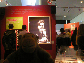 Mr Monkey looking at the 'Gunchester' section of the exhibition