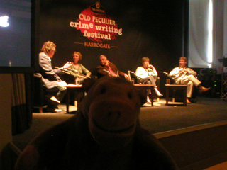 Mr Monkey watching the Country Matters panel