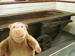 Mr Monkey examining a peat bath