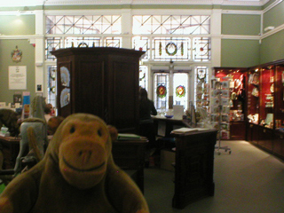 Mr Monkey looking at the entrance and ticket office of the Pump Room