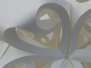 A close view of a paper sculpture by Richard Sweeney