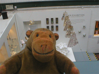 Mr Monkey looking down on Jennifer Collier's dresses