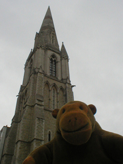 Mr Monkey looking up at the Lincoln Tower