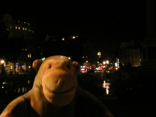 Mr Monkey crossing Trafalgar Square in the dark