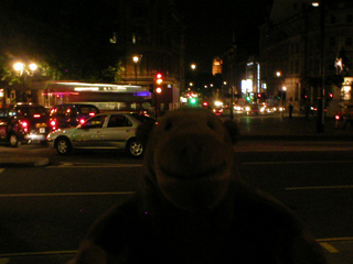 Mr Monkey looking down Whitehall at night