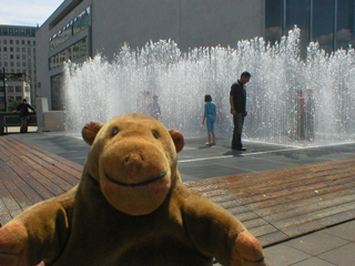 Mr Monkey looking at the Appearing Rooms fountain