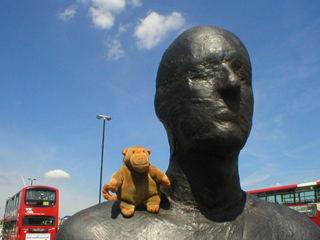 Mr Monkey sitting on a Gormley's shoulder