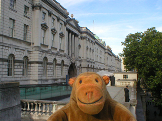 Mr Monkey looking at Somerset House from Waterloo Bridge