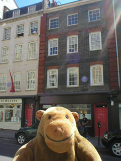 Mr Monkey looking across Brook Street at the front of the Handel House museum