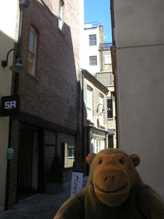 Mr Monkey outside the entrance to the Handel House museum