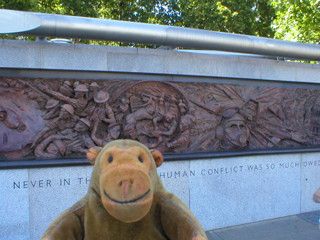 Mr Monkey looking at the Britain at War side of the monument