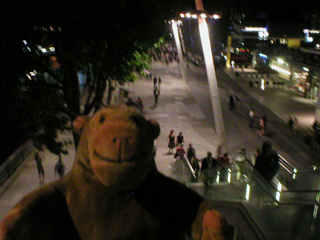 Mr Monkey looking down on the South Bank from the Hungerford bridge