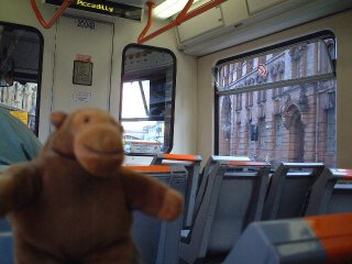 Mr Monkey riding a tram