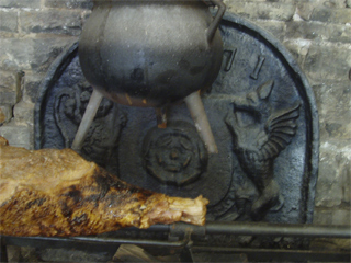 The fireback and a cooking pot