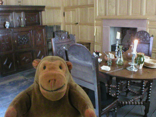 Mr Monkey looking around the 17th century parlour