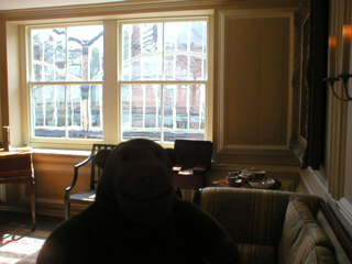 Mr Monkey looking around the 19th century parlour