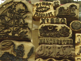 The stamps used to mark the ends of bolts of cloth