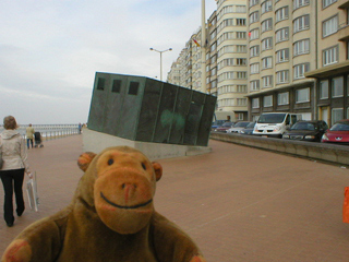 Mr Monkey looking at the bronze model of Ensor's studio