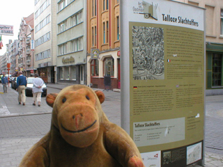 Mr Monkey looking at the Numerous Victims board