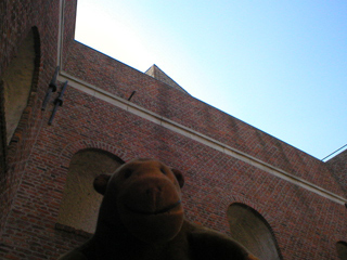 Mr Monkey looking up at the roof of the tower