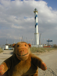 Mr Monkey looking at Lange Nelle lighthouse