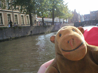 Mr Monkey looking towards the fish market from the boat