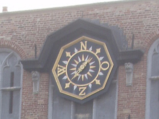 The compass on the front of the Boechoute House