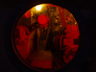 The diesel engines seen through the inspection window