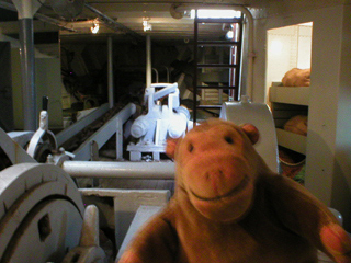 Mr Monkey looking at the anchor mechanism of the lightship