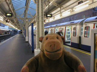 Mr Monkey on the platform of Hammersmith underground station