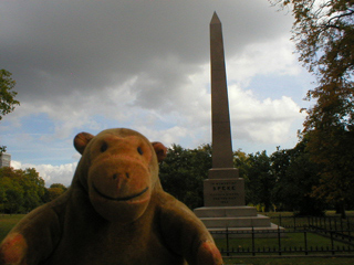 Mr Monkey in front of the Speke Monument