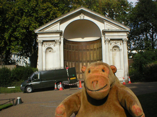 Mr Monkey looking at the shelter being cleaned