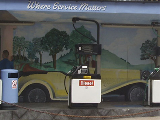 A thirties touring car painted on a garage wall