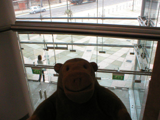 Mr Monkey looking down on the front doors of the Bridgewater from the choir level