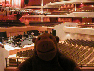 Mr Monkey looking at the stage from the choir circle