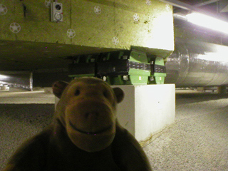 Mr Monkey looking at the springs supporting the Bridgewater Hall