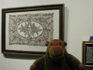Mr Monkey looking at Pamela So's design as a framed print