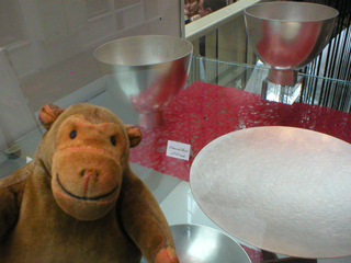 Mr Monkey looking at bowls by Mary Ann Simmons