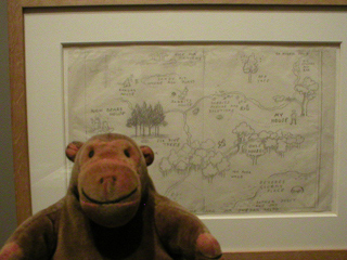 Mr Monkey looking at the original map for Winnie the Pooh