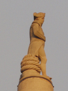 The statue on top of Nelson's column