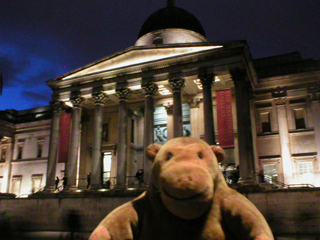 Mr Monkey looking at the National Gallery by night