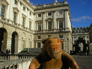 Mr Monkey looking at the Strand wing of Somerset House from the courtyard